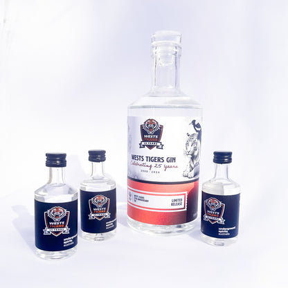 50ml bottles and 700ml bottle of Wests Tigers 25th Anniversary Gin by Underground Spirits, celebrating 25 years of the legendary rugby league team with vibrant citrus notes and dynamic flavours