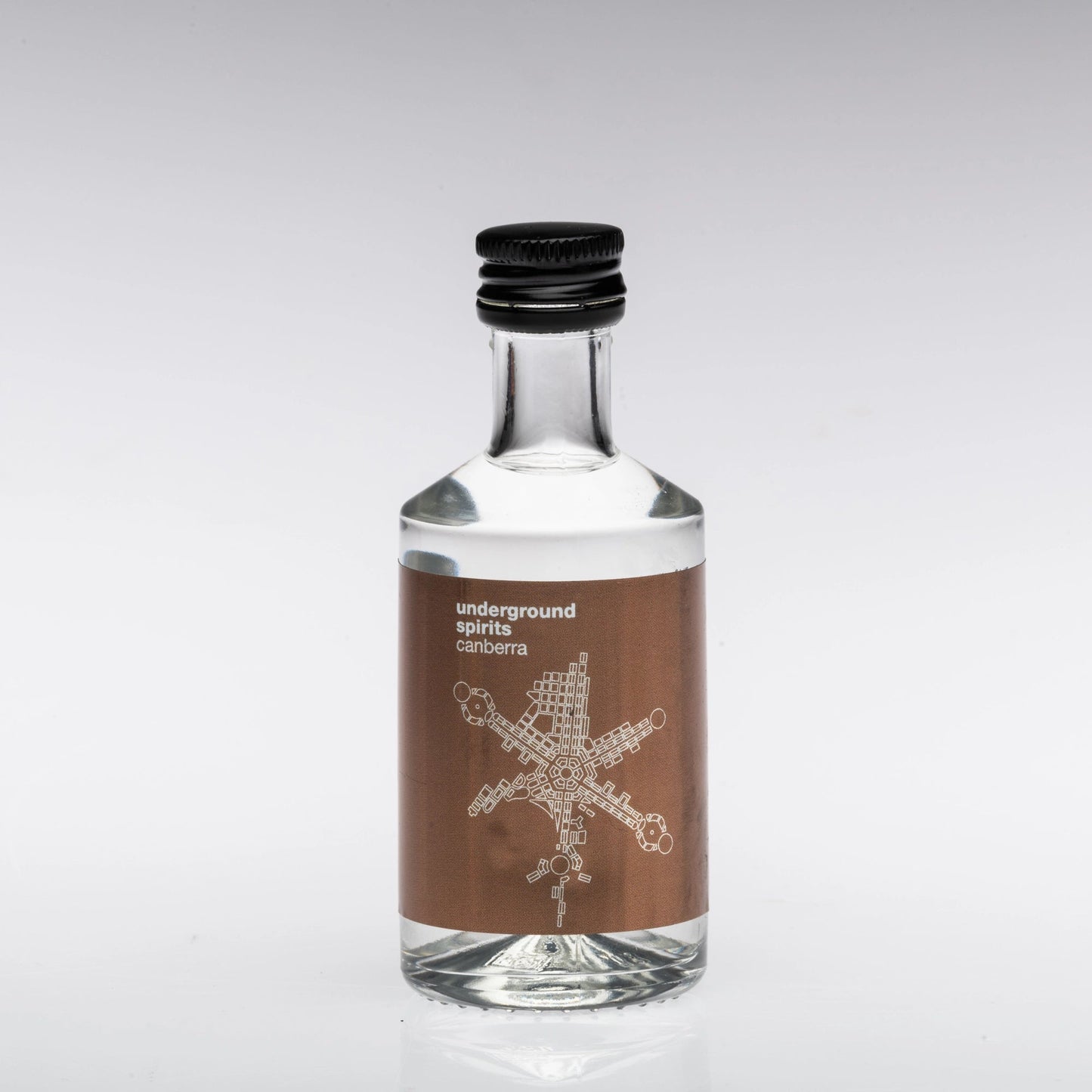 50ml bottle of Underground Spirits Caramel Vodka made from award-winning Australian wheat vodka and rich Queensland caramel